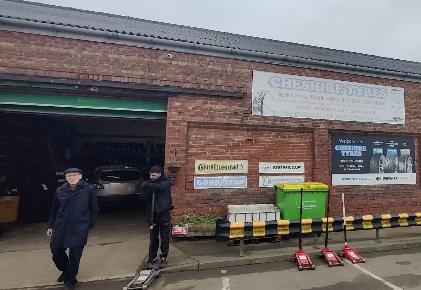 The front of the Cheshire Tyres unit on New Cheshire Business Park, with the workshop door open